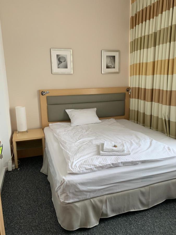 Queen Room with Shared Bathroom